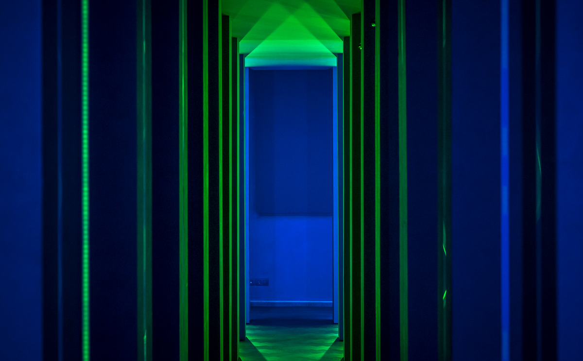 Image of a blue and green hallway, Art installation at DIVA, Antwerp.